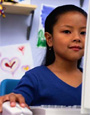 children in front of computer screen